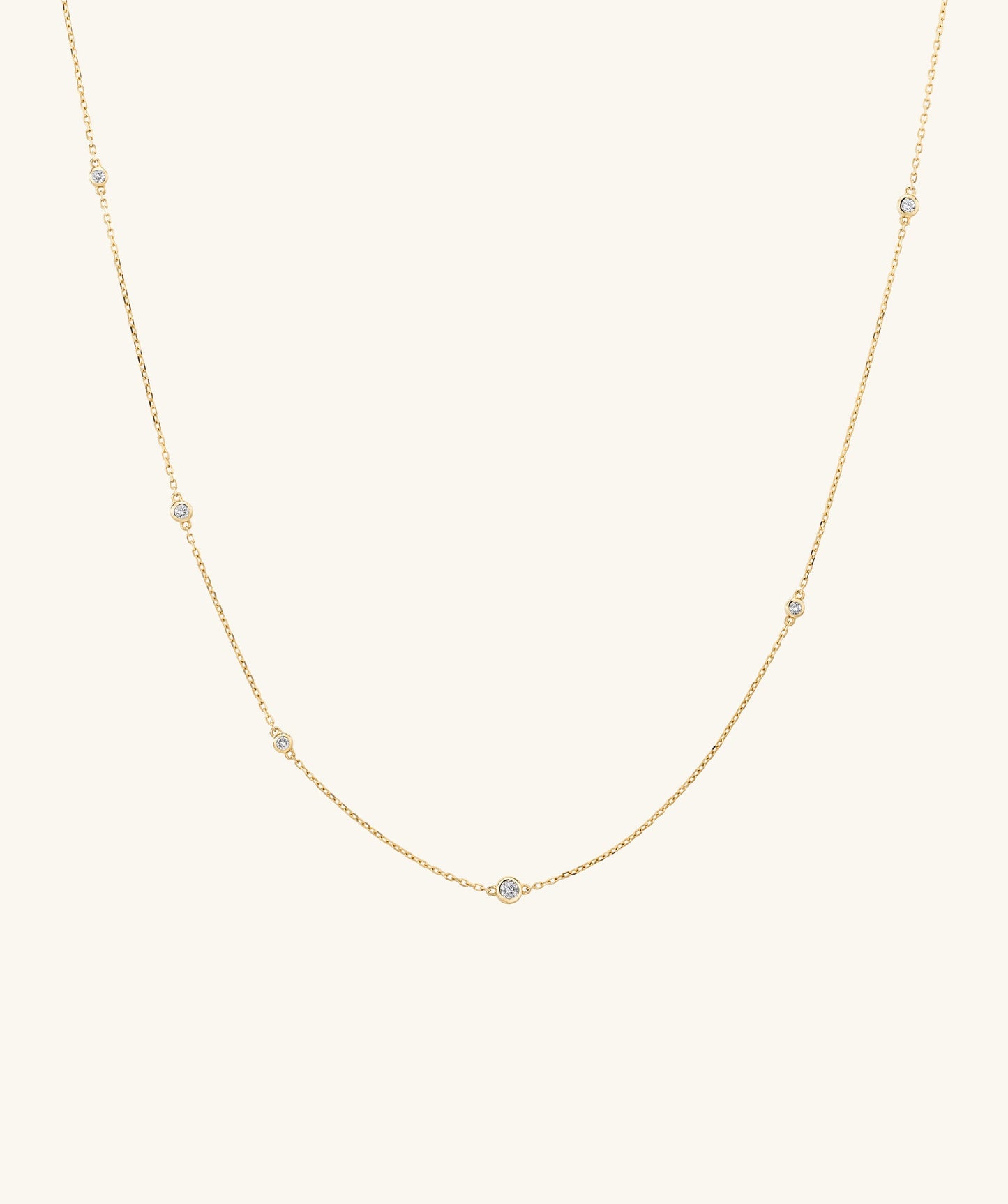 CROSS CHAIN WITH ROUND ZIRCONIA NECKLACE