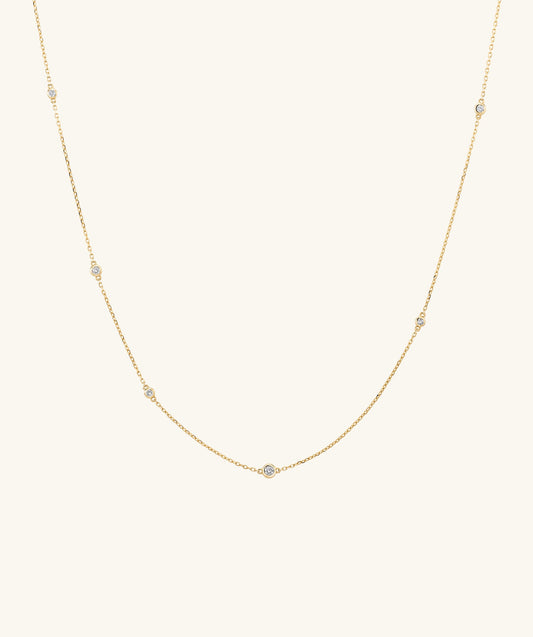 CROSS CHAIN WITH ROUND ZIRCONIA NECKLACE
